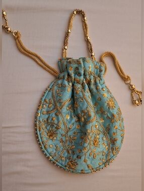 Embellished Teal Potli Bag with Gold Embroidery